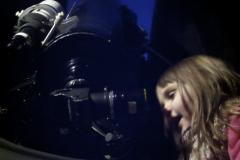 Girl using the 8 inch telescope