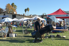 RFO's Science Day booth with a telescope
