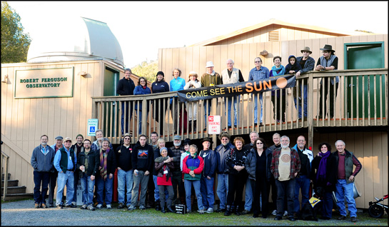 After preparing the Observatory and telescopes for a Public Observing night, docents take a break for this photo. Photo by Len Nelson.
