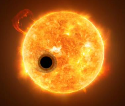 Artist's concept image of an exoplanet transiting in front of its host star.